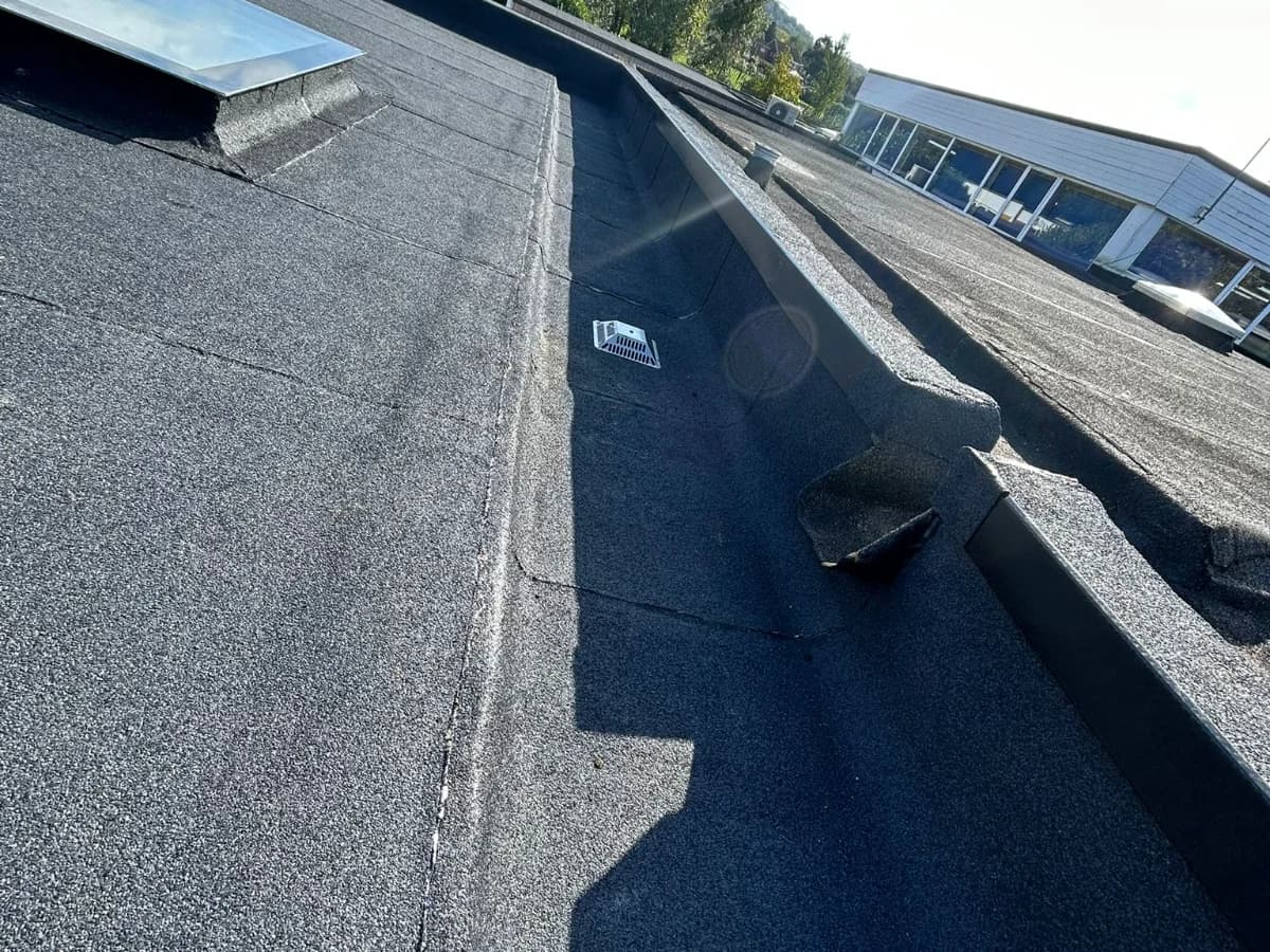 Completed flat roof with a parapet detail on a building in County Durham