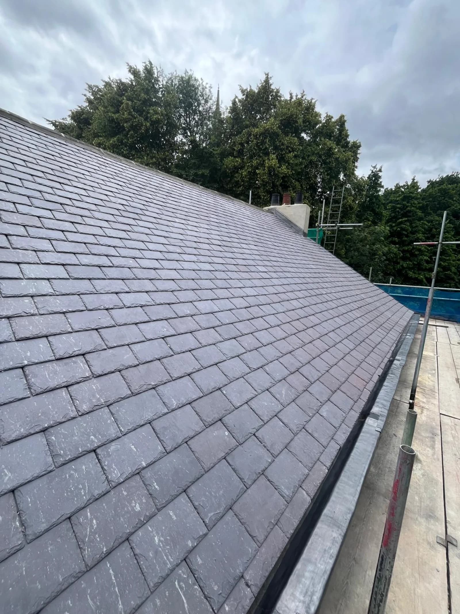 Close detail of a completed natural slate roof in County Durham